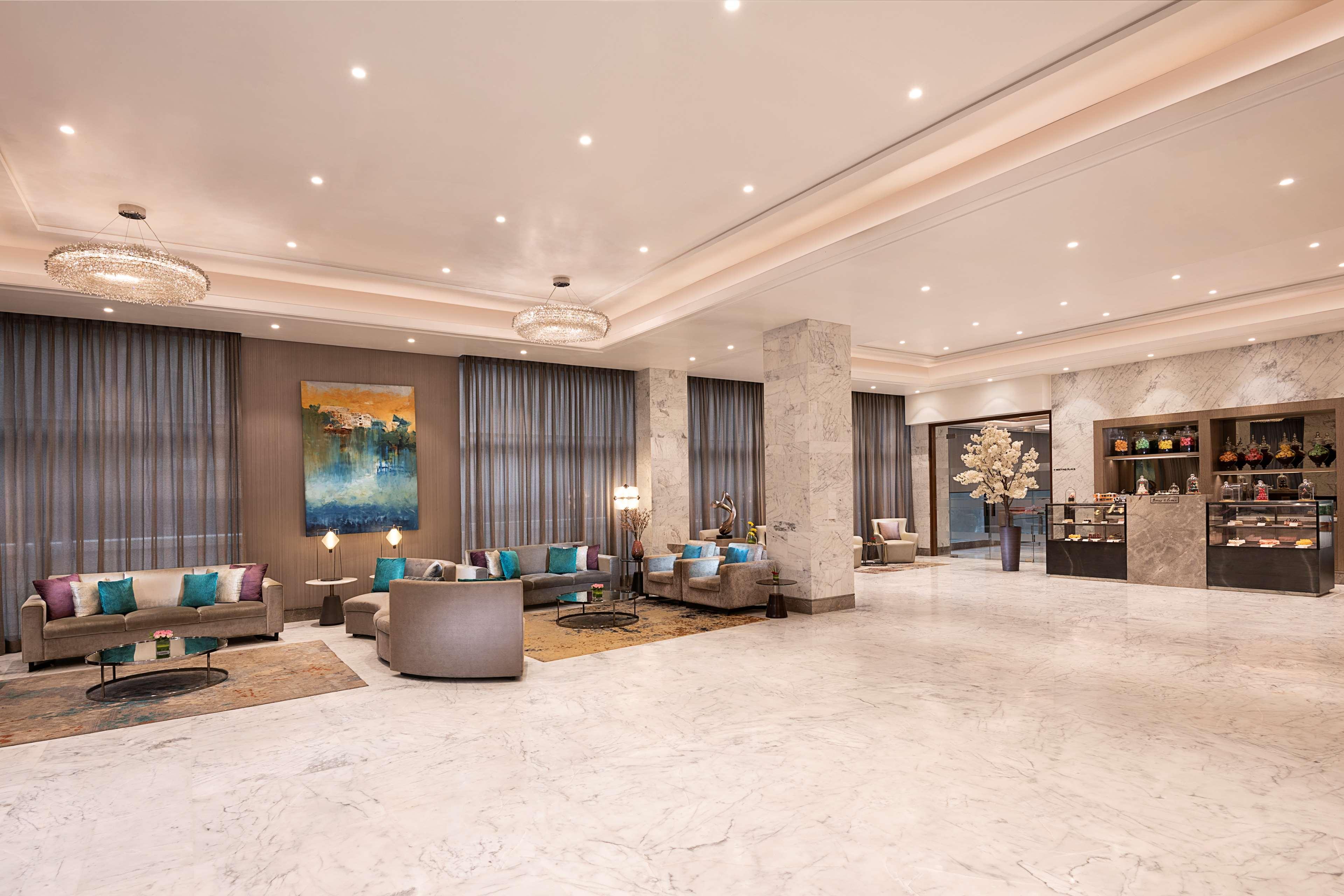Radisson Mumbai Andheri Midc Bombaim Exterior foto Lobby